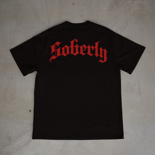 Soberly unisex black "NA raised me" T-shirt